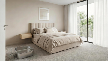 Furrbby stainless steel cat litter box placed in a bright modern bedroom. Odor-resistant metal litter tray blends seamlessly with home decor.