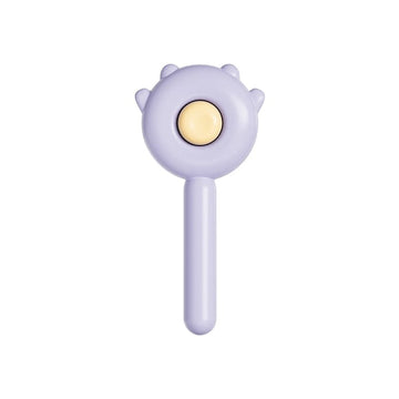Back view of Furrbby purple cat-ear pet grooming brush, showing the self-cleaning button