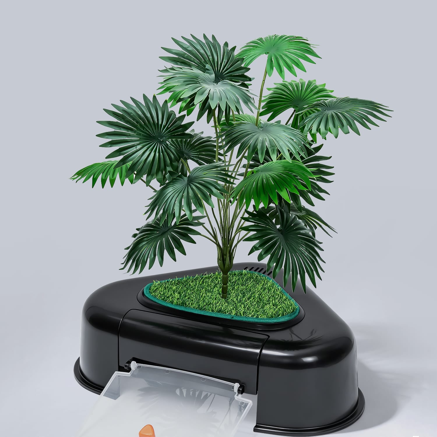Close-up of fan palm plant on Furrbby black triangular litter box, realistic foliage for decor disguise